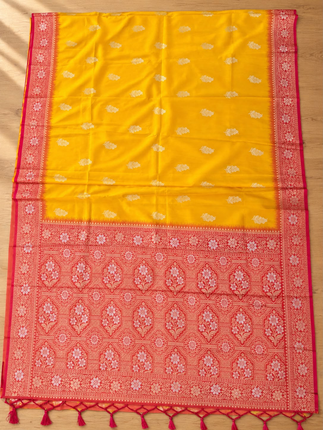 Sunhera Golden Yellow Saree with Rani Pink Floral Border